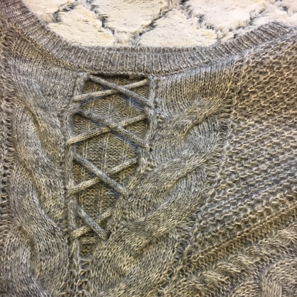 Maurice’s sweater. Never been worn.